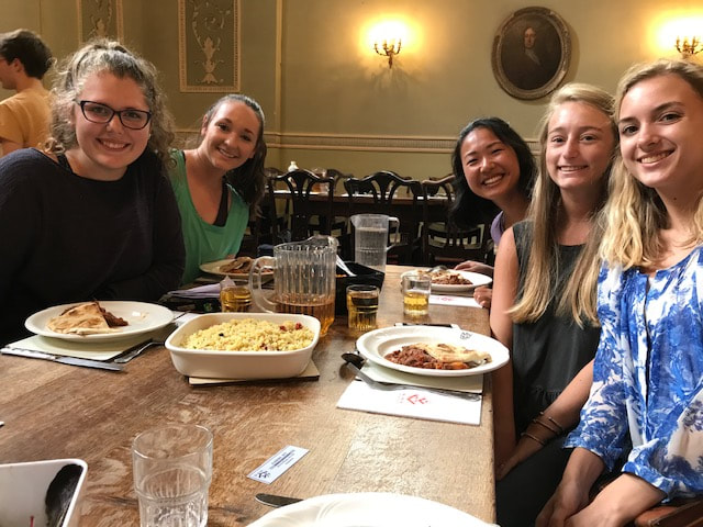 Five students at breakfast in the Worcester College dinning hall